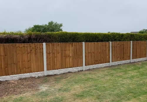 another back garden and a long run of fencing installed